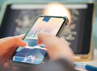 Individual reviewing clear process for withdrawing funds and transferring money